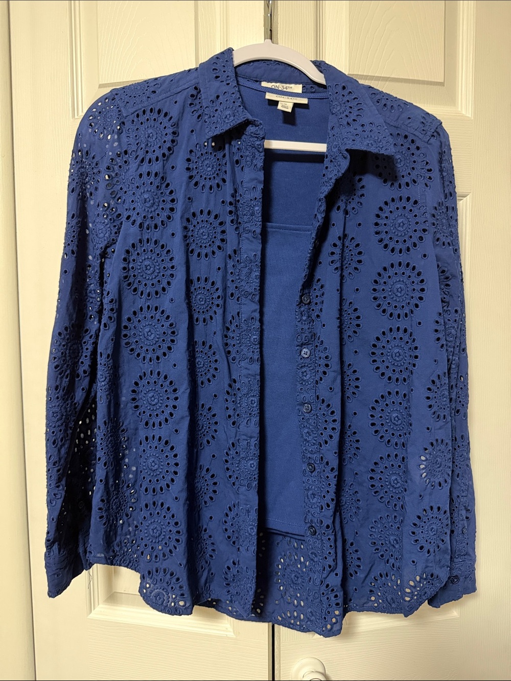 Blue eyelet twin set. On 34th size medium. Worn once.